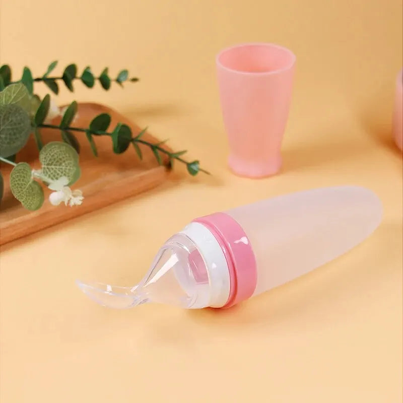 Babyflasche mit Quetschlöffel